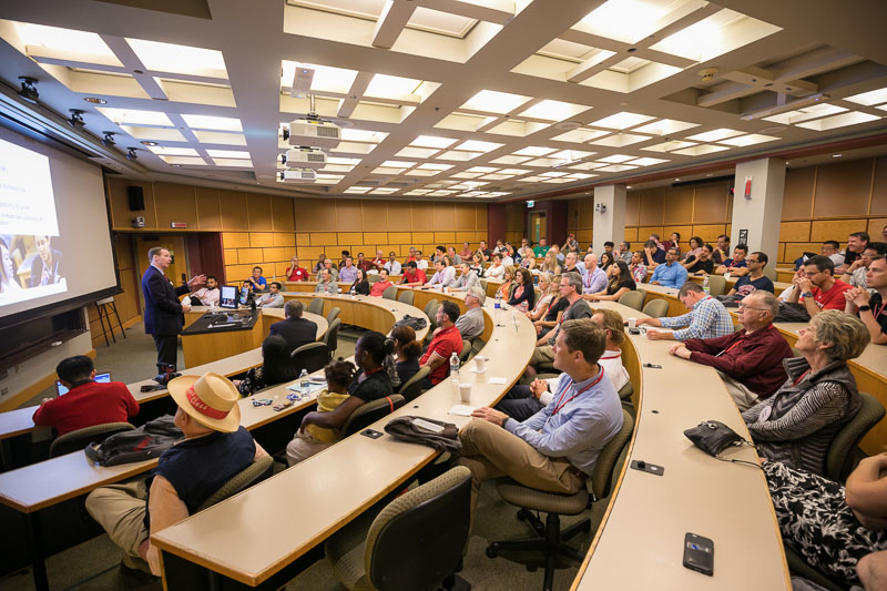 Photo of attendees sitting in a classroom in Sage Hall
