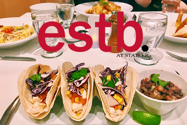 Photo of tacos with estb. text overlayed