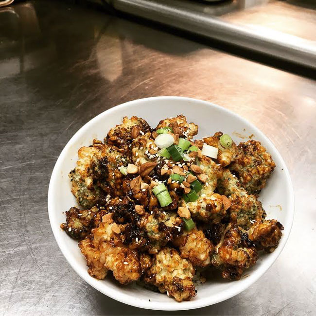 Photo of a dish of food, shrimp and sesame broccoli