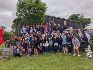 Photo of the group outside the entrance to the winery