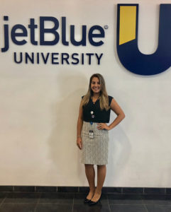 Sharonee Vaca with JetBlue University sign