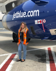 Sharonee Vaca with JetBlue plane