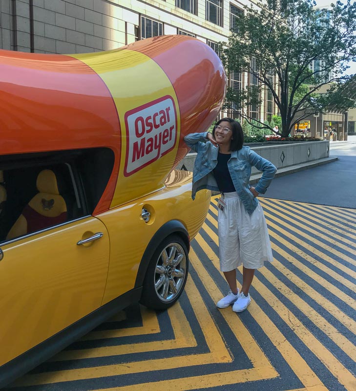 Photo of Alison with the Oscar Meyer hot dog car