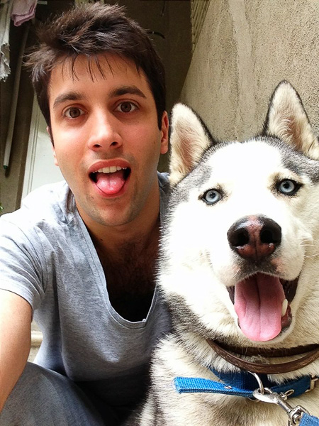 Photo of Erekle and a husky dog