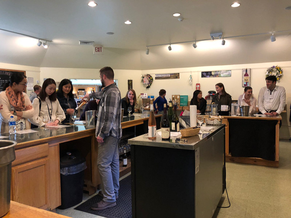 A group of MMH students enjoy an educational wine tasting session