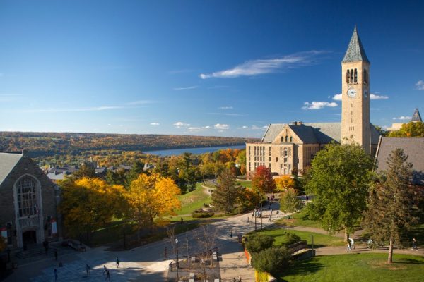 McGraw Tower, Uris Library, Ho Plaza, and Cayuga Lake in fall