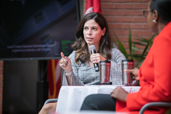 Photo of Angela speaking at the keynote event