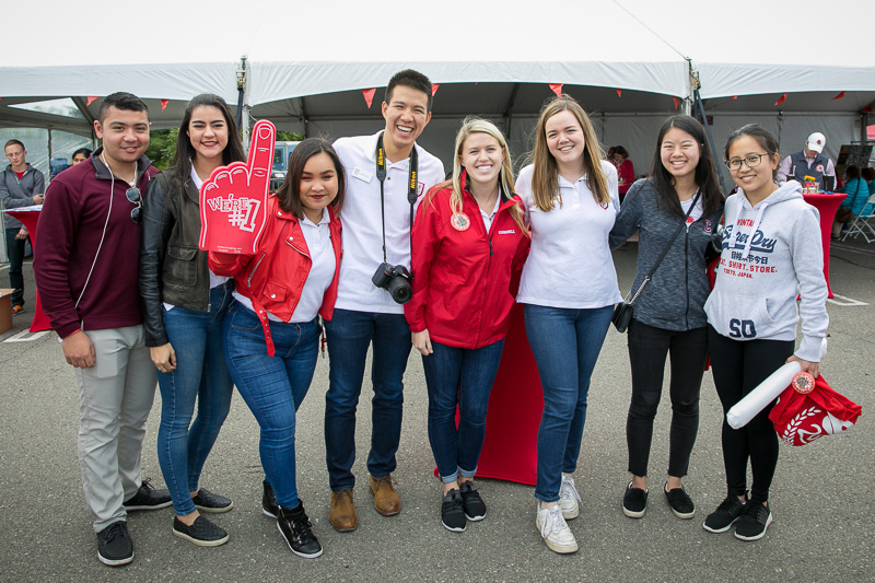 Photo of a group of students outside a tent at Homecoming