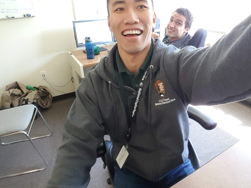 Keith taking a selfie with a co-worker