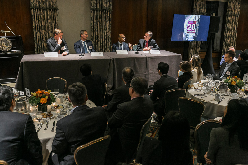 Panel sitting in the front of the room