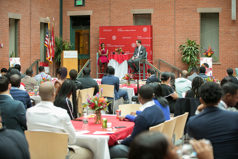 Marmeline address a packed atrium in Sage Hall