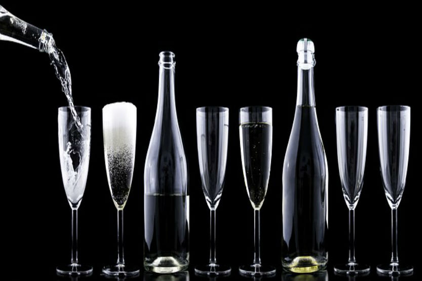 champagne flutes on bar top