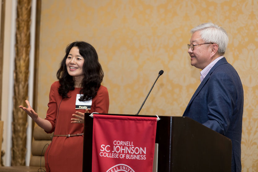 Helen Chun, associate professor of services marketing at the School of Hotel Administration and moderator Ted Teng '79, president and CEO of the Leading Hotels of the World.