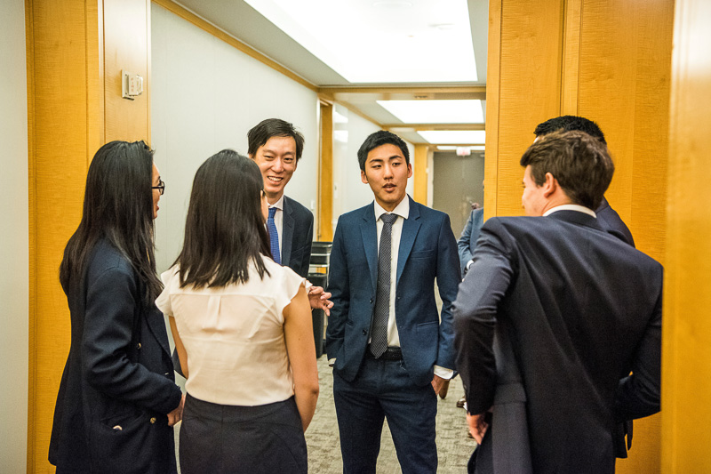 Student talk in a doorway