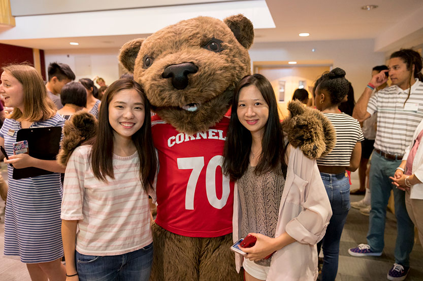Students with Cornell bear mascot