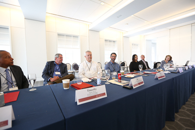 A table of speakers talking