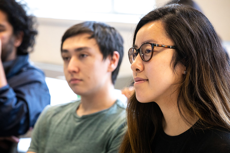 Two students sitting next to each other