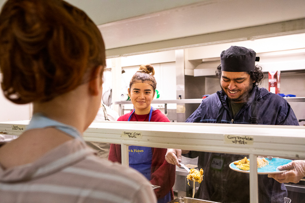 Students serving meals