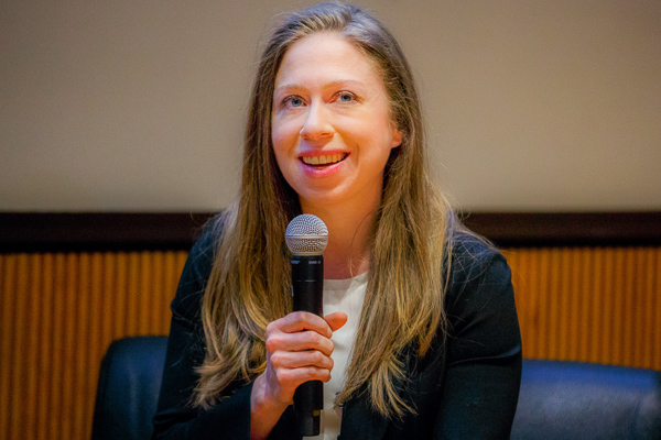 Chelsea Clinton holding a microphone