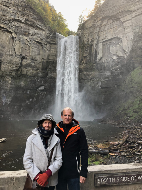 The Jennings stand in front of a waterfall
