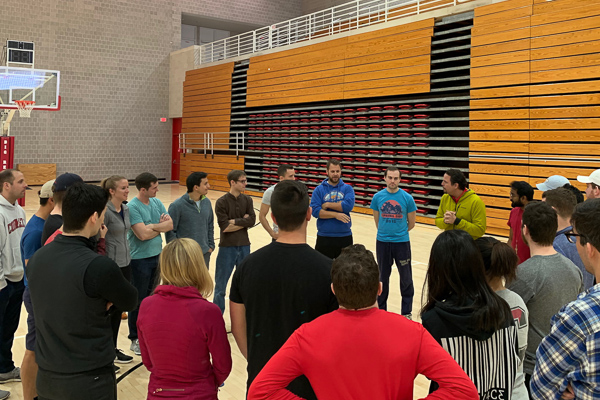 Students gather in a gymnasium