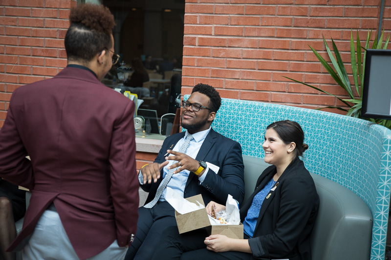 Students talking in the atrium