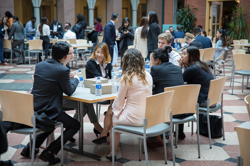 Students networking in the atrium