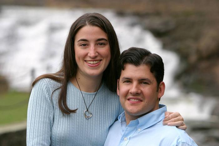 Kara and Matt in front of a waterfall