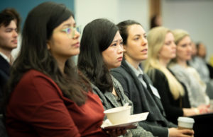 Audience listening to presentations