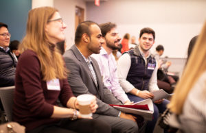 Audience listening to presentations