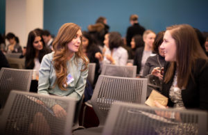 Seated audience talking