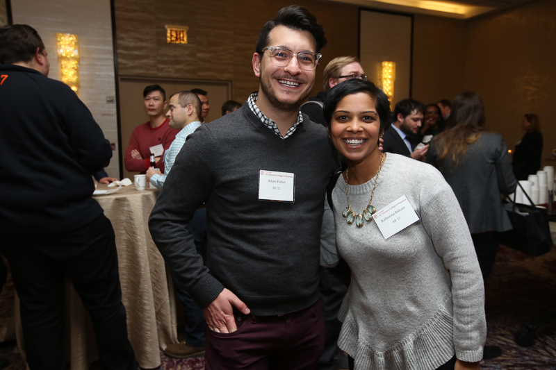 Two guests pose for a photo