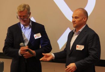 John Kyles and Alex Ivanov, MBAs '00 and founders of Big Red Ventures, speak at the first annual meeting nearly two decades after they left Johnson.