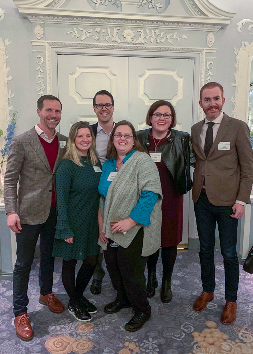 Six faculty pose for a photo