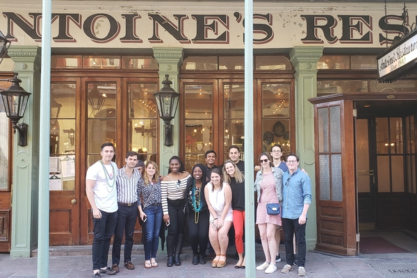 MBA students in front of famous restaurant