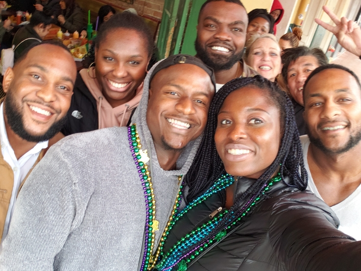 Students posing for a photo on Bourbon Street