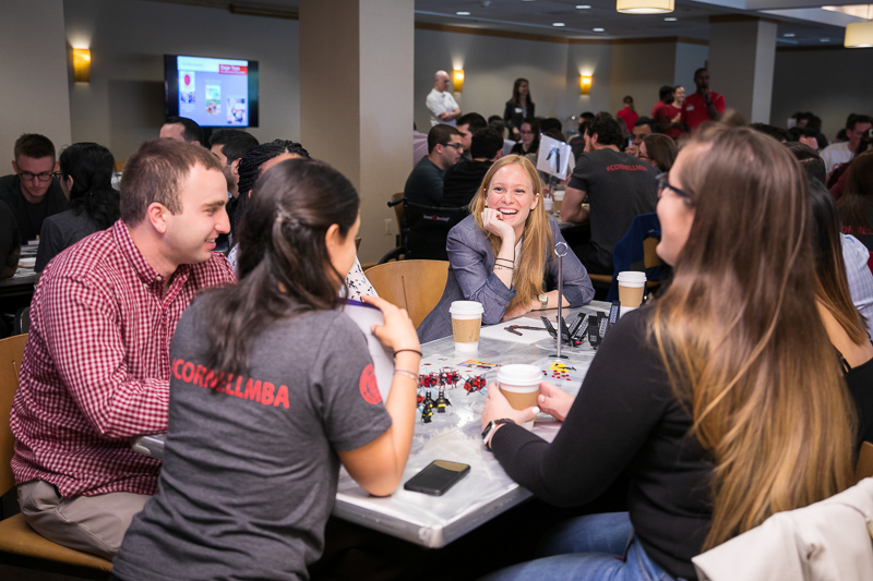 A team talking over their lego table