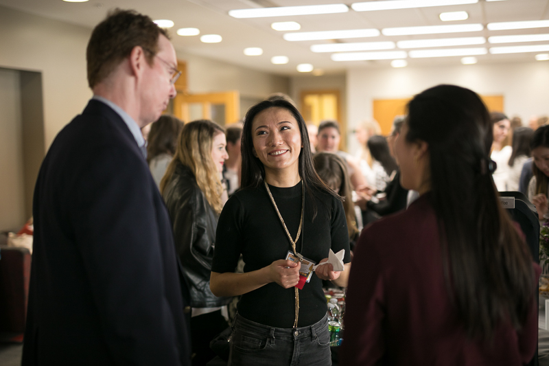 Students talking at the mixer