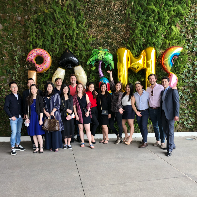 MMH group stands with balloons that spell out PALMS