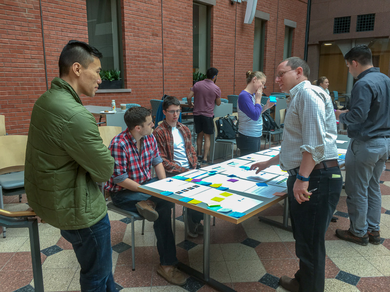 Mark Milstein talking with students 