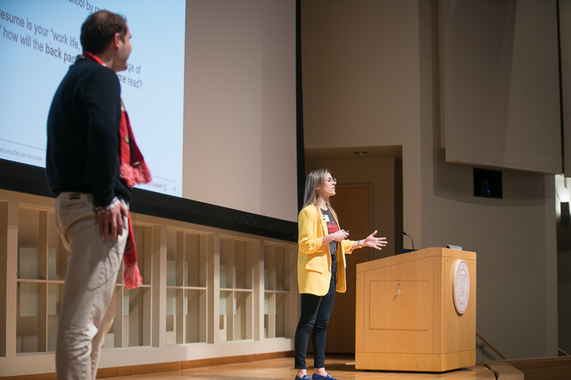 Student council co-chairs presenting on stage