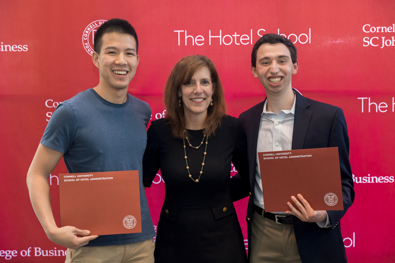 Jeremy, Dean Walsh, and Justin pose for a photo holding their awards