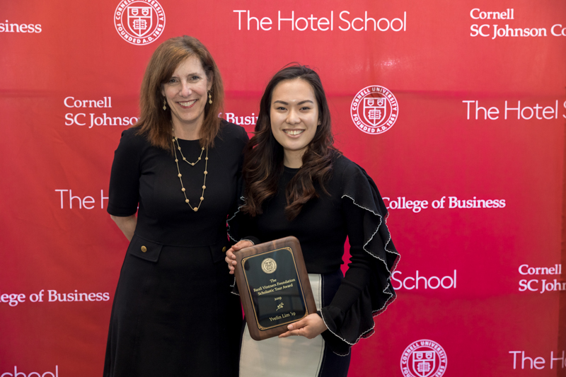 Dean Kate Walsh and Yvelin with her plaque 