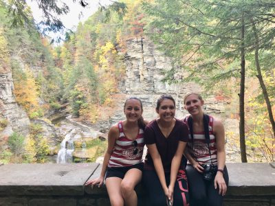 From left to right: Jessie, Gigi Carapaica and Gina Tucker hiking at the Robert Treman State Park