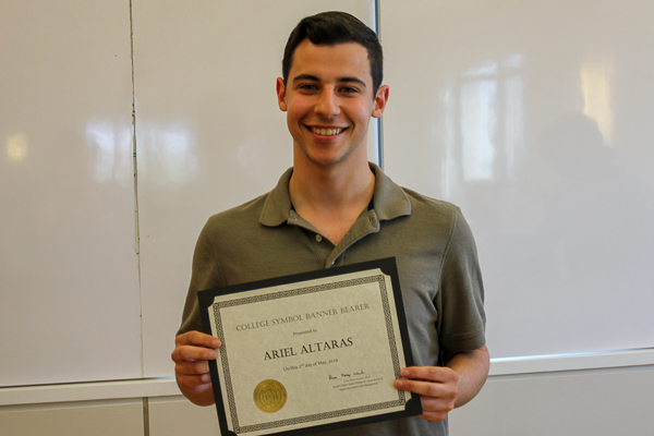 Airel Altaras holding his award