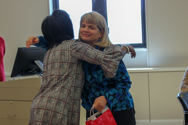 Deb Streeter hugs Dean Wooten