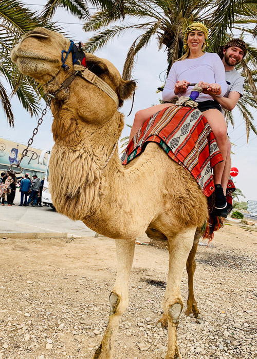 Katie riding a camel