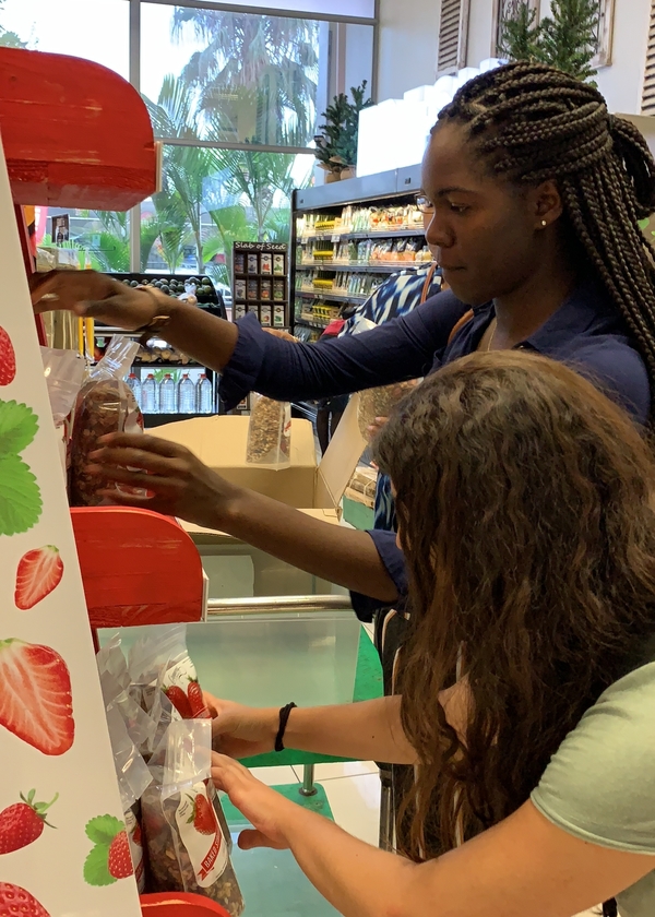 Krystal looking at dried strawberries