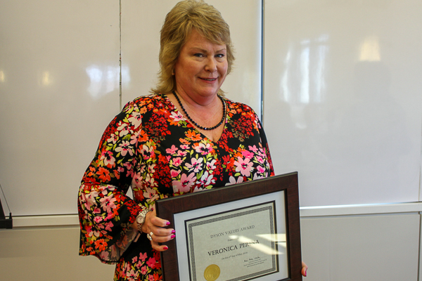 Veronica Perina holding her award