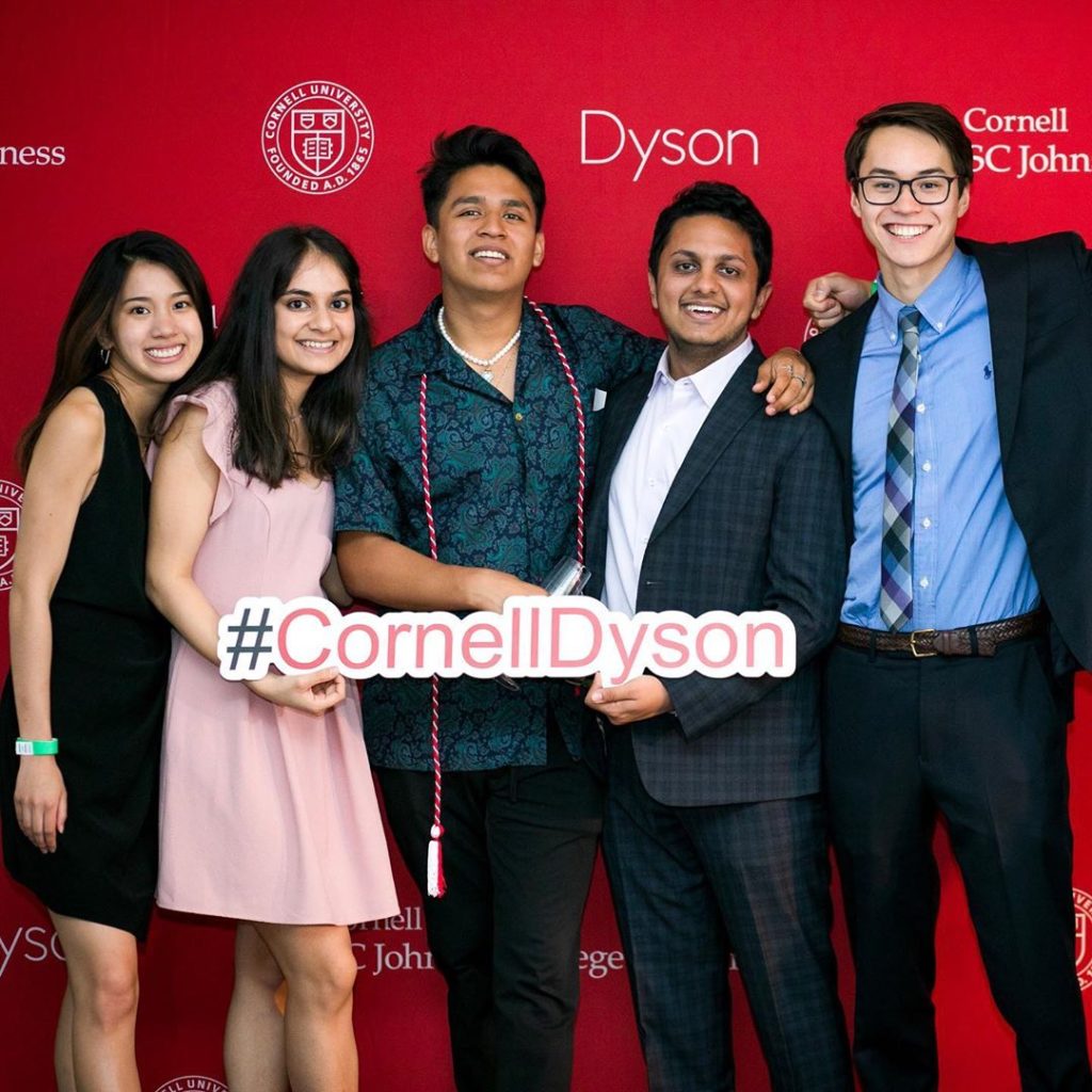 Students holding a #CornellDyson sign